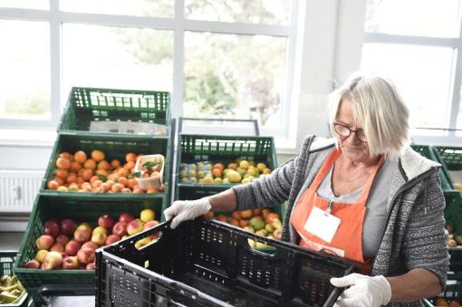 Grapefruit slice atop a pile of other slices
